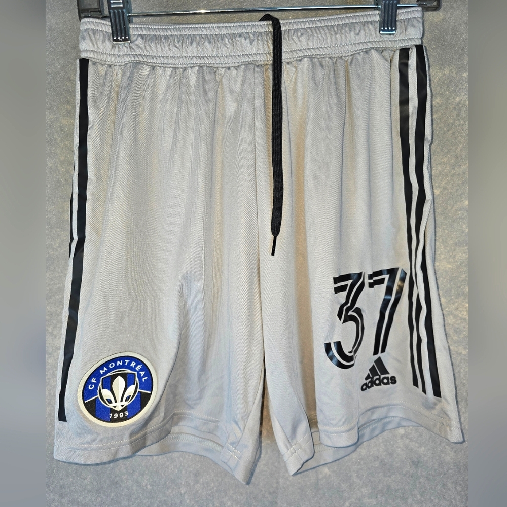 Adidas Silver Athletic Shorts with Black Accents Mens MED. ASST. # On Left Leg.